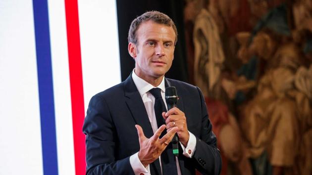 French president Emmanuel Macron, who has embarked on a cost-cutting drive, said he is now asking heritage lovers to gamble on conservation to avoid increasing taxes.(AFP) French president Emmanuel Macron, who has embarked on a cost-cutting drive, said he is now asking heritage lovers to gamble on conservation to avoid increasing taxes.(AFP)