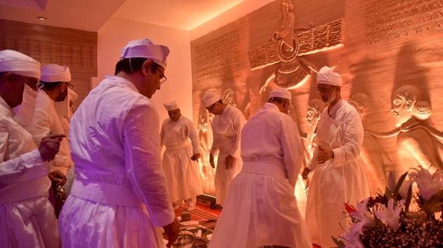 A ceremony was held on Thursday, May 31, to enthrone the Dadgah Saheb, or Holy Fire, in the ground floor of the building. Here, priests perform a religious ceremony. (Aalok Soni/HT PHOto ) 