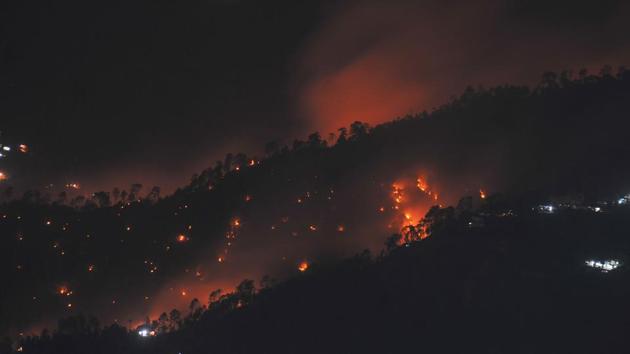 Wildfires burn through a forest near Shimla, Himachal Pradesh on May 31, 2018. (AFP) Wildfires burn through a forest near Shimla, Himachal Pradesh on May 31, 2018. (AFP)