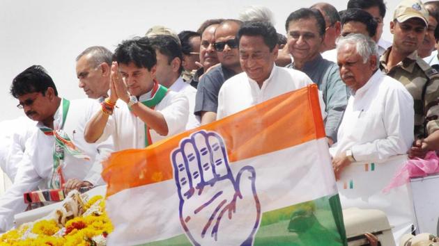 Madhya Pradesh Congress Committee president Kamal Nath and chairman of Madhya Pradesh election campaign committee Jyotiraditya Scindia during a roadshow in Bhopal. (PTI File Photo) Madhya Pradesh Congress Committee president Kamal Nath and chairman of Madhya Pradesh election campaign committee Jyotiraditya Scindia during a roadshow in Bhopal. (PTI File Photo)