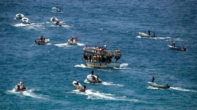 Setting to sail from Gaza City harbour, a group of Palestinian activists on fishing boats protest as they try to breach Israel's naval blockade on Gaza on May 29, 2018. (Thomas Coex / AFP) Setting to sail from Gaza City harbour, a group of Palestinian activists on fishing boats protest as they try to breach Israel's naval blockade on Gaza on May 29, 2018. (Thomas Coex / AFP)