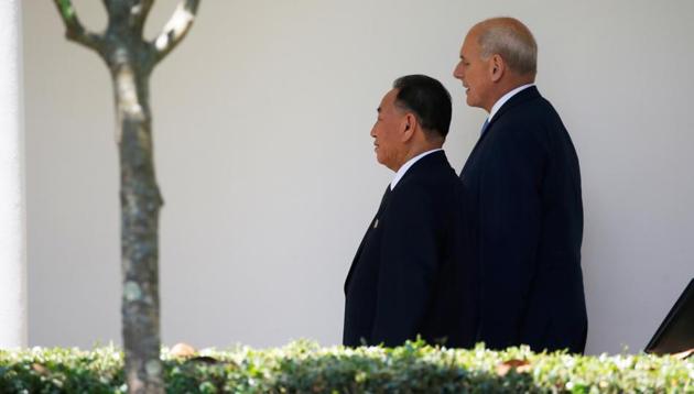 North Korean envoy Kim Yong Chol walks with White House Chief of Staff John Kelly as he arrives to deliver a letter to US President Donald Trump at the White House.(Reuters)