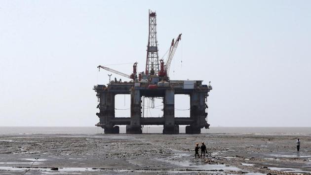 Workers pull a rope tied to a decommissioned oil rig to dismantle it. According to the Ship Recycling Industries Association India, the number of active yards in Alang have fallen to 50 this year from more than 100 in 2014 and the number of vessels beached also dropped to a six-year low of 275 last year. “China is selling below the price of recycled steel,” said Amit B. Padia, owner of Sagar Laxmi Ship Breakers. (Amit Dave / REUTERS)