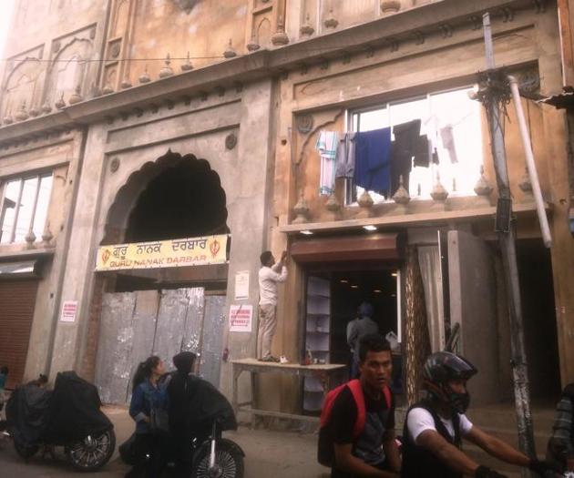 The Guru Nanak Durbar Gurdwara under reconstruction in the crowded Punjabi Lane of Bara Bazaar in Shillong.(HT Photo)