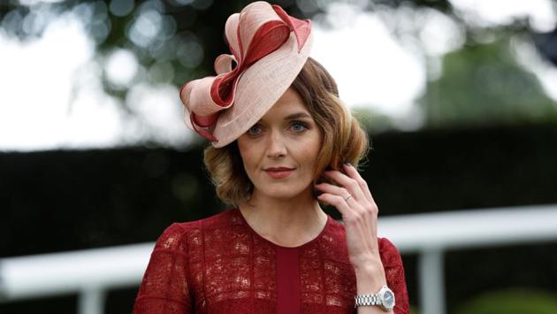 Jockey and former cyclist Victoria Pendleton during the Derby Festival. Women arrived at the Investec Derby Festival summer dresses and statement hats as per tradition. (Peter Nicholls / REUTERS) Jockey and former cyclist Victoria Pendleton during the Derby Festival. Women arrived at the Investec Derby Festival summer dresses and statement hats as per tradition. (Peter Nicholls / REUTERS)