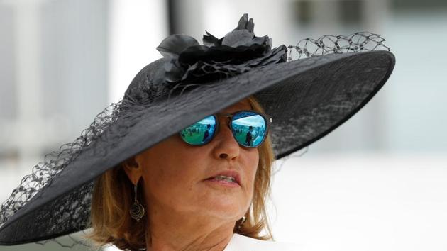 Guests were told to “dress to impress” by organisers in order to stand a chance to win the Style Award title and £5000. (Peter Nicholls / REUTERS) Guests were told to “dress to impress” by organisers in order to stand a chance to win the Style Award title and £5000. (Peter Nicholls / REUTERS)