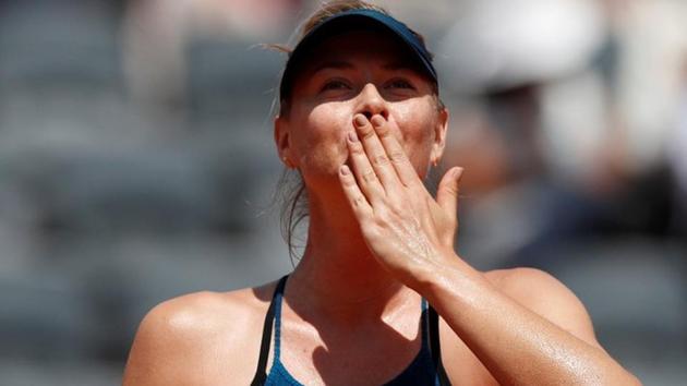 Maria Sharapova celebrates after winning her third round match against Czech Republic's Karolina Pliskova.(REUTERS)