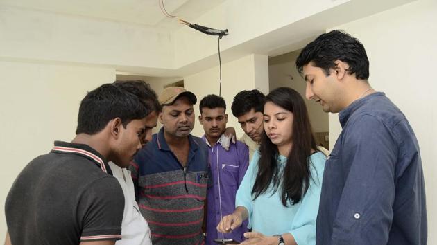Supratik Ghatak (right) an IT professional and Debashree Ghatak (second right), an architect, created Renewate to make home renovations smart and easy. The app has given contractors, seen here, a more organised manner of reaching customers.(Ravindra Joshi/HT PHOTO) Supratik Ghatak (right) an IT professional and Debashree Ghatak (second right), an architect, created Renewate to make home renovations smart and easy. The app has given contractors, seen here, a more organised manner of reaching customers.(Ravindra Joshi/HT PHOTO)