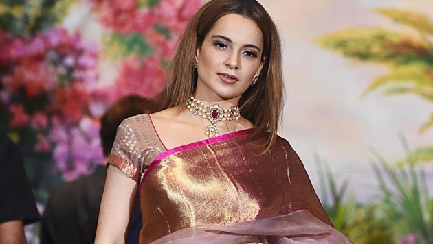 Kangana Ranaut poses for a picture during the wedding reception of Sonam Kapoor and Anand Ahuja.(AFP) Kangana Ranaut poses for a picture during the wedding reception of Sonam Kapoor and Anand Ahuja.(AFP)