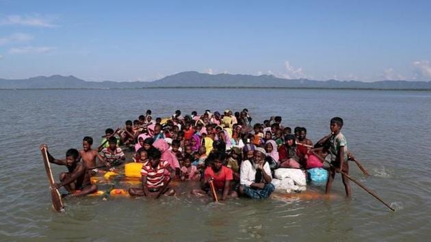 Rohingya refugees cross the Naf River with an improvised raft to reach to Bangladesh at Sabrang near Teknaf, Bangladesh November 10, 2017. (Reuters File Photo) Rohingya refugees cross the Naf River with an improvised raft to reach to Bangladesh at Sabrang near Teknaf, Bangladesh November 10, 2017. (Reuters File Photo)