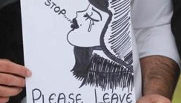 Protesters hold placards during demonstration over crimes against women and children. (Waseem Andrabi/HT File Photo) Protesters hold placards during demonstration over crimes against women and children. (Waseem Andrabi/HT File Photo)