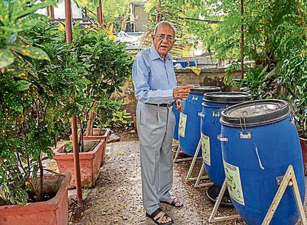 CK Narula shows the compost pit installed in his society.(Satish Bate/HT Photo)