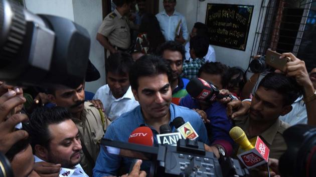 Actor Arbaaz Khan talks to press outside Thane Anti Extortion Cell in Thane on June 2.(IANS Photo)