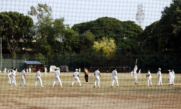 A student (fifth from right) jumps high to catch the ball, but misses as the coach trains them to hone their fielding skills during a cricket practicecumtraining session at the Deccan Gymkhana ground this week. (RAHUL RAUT/ HT PHOTO ) A student (fifth from right) jumps high to catch the ball, but misses as the coach trains them to hone their fielding skills during a cricket practicecumtraining session at the Deccan Gymkhana ground this week. (RAHUL RAUT/ HT PHOTO )