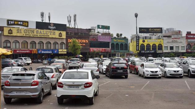 A view of cars parked in Gurugram. (HT PHOTO) A view of cars parked in Gurugram. (HT PHOTO)