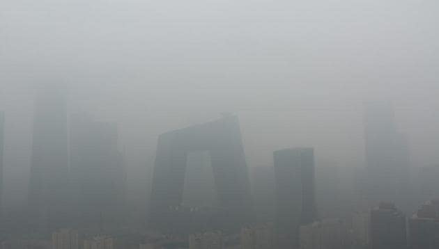 Buildings are seen amid smog on a polluted day in Beijing, China on April 2. (Reuters) Buildings are seen amid smog on a polluted day in Beijing, China on April 2. (Reuters)