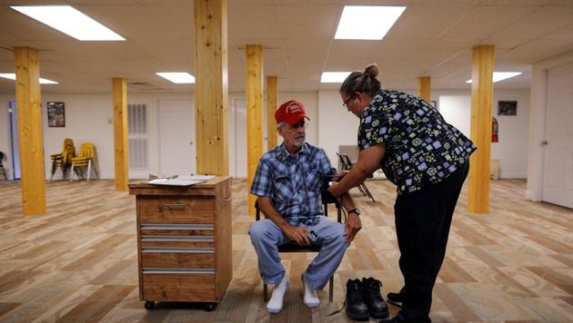 Nurse Melissa Muse checks the blood pressure of retired coal miner James Marcum, who has black lung disease, in St. Charles, Virginia. Marcum worked at a surface strip mine for 20 to 25 years, but has not yet been approved for benefits for his illness. For ex-miners coping with this disease, the federal fund that pays for medical care is a lifeline under threat. (Brian Snyder / REUTERS) Nurse Melissa Muse checks the blood pressure of retired coal miner James Marcum, who has black lung disease, in St. Charles, Virginia. Marcum worked at a surface strip mine for 20 to 25 years, but has not yet been approved for benefits for his illness. For ex-miners coping with this disease, the federal fund that pays for medical care is a lifeline under threat. (Brian Snyder / REUTERS)