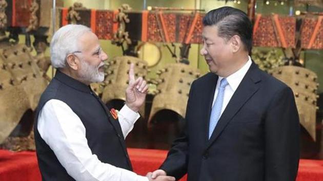 In this photo released by China's Xinhua News Agency, Indian Prime Minister Narendra Modi, left, shakes hands with Chinese President Xi Jinping as they visit an exhibition of cultural relics at the Hubei Provincial Museum in Wuhan in central China's Hubei Province, Friday, April 27, 2018. (AP File Photo) In this photo released by China's Xinhua News Agency, Indian Prime Minister Narendra Modi, left, shakes hands with Chinese President Xi Jinping as they visit an exhibition of cultural relics at the Hubei Provincial Museum in Wuhan in central China's Hubei Province, Friday, April 27, 2018. (AP File Photo)