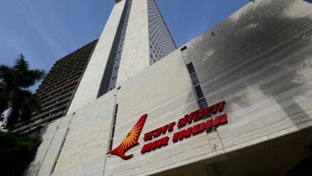 File Photo of Air India logo seen on the facade of its office building in Mumbai. (Reuters) File Photo of Air India logo seen on the facade of its office building in Mumbai. (Reuters)