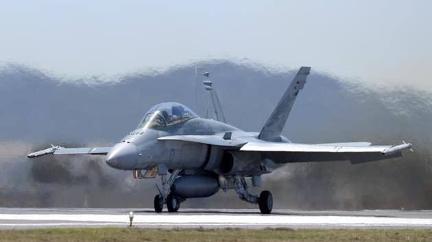 An F/A-18F Super Hornet fighter jet, manufactured by Boeing Co., taxis on the tarmac during the Australian International Airshow. The Indian govt said it would consider twin-engine aircraft such as Boeing’s twin-engine F/A-18 Super Hornet for the deal.(Carla Gottgens/Bloomberg)