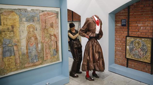 Artists of Artel Myth theatre backdrop religious paintings while prepping for the festival. “We hope to enhance the Romanian public’s abilities to truly understand and appreciate this art form, regarded in the past as a mere occupation associated with amateurs or even begging,” Masca Theatre director Mihai Malaimare told The Associated Press. (Vadim Ghirda / AP) Artists of Artel Myth theatre backdrop religious paintings while prepping for the festival. “We hope to enhance the Romanian public’s abilities to truly understand and appreciate this art form, regarded in the past as a mere occupation associated with amateurs or even begging,” Masca Theatre director Mihai Malaimare told The Associated Press. (Vadim Ghirda / AP)