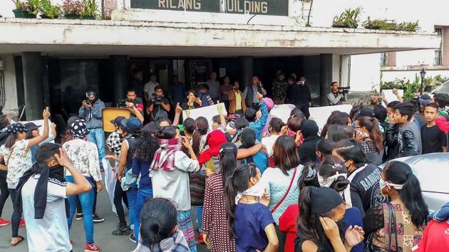 People from different parts of the city stage a protest Meghalaya Secretariat during curfew, in Shillong on Monday, June 04, 2018. )(PTI Photo)