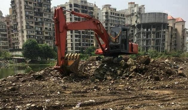 Pramod Patil, environment and forest officer, Cidco, said they cannot do anything because the pond is neither a wetland nor a natural body.(HT Photo) Pramod Patil, environment and forest officer, Cidco, said they cannot do anything because the pond is neither a wetland nor a natural body.(HT Photo)