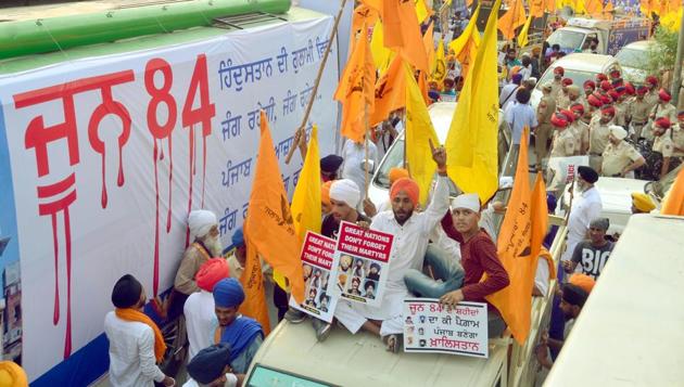 Dal Khalsa activists take out protest march on the eve of Operation Bluestar anniversary in Amritsar on Tuesday. (Sameer Sehgal/HT) Dal Khalsa activists take out protest march on the eve of Operation Bluestar anniversary in Amritsar on Tuesday. (Sameer Sehgal/HT)