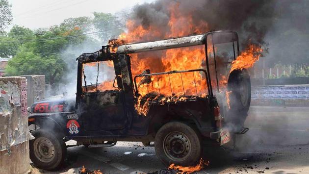 A police jeep seen torched by Allahabad Central University students, who were protesting against the 'hostel washout' decision of the administration, in Allahabad. Hostel residents agitated following orders from the university asking them to vacate within one week’s time. A protest, staged on the roads soon turned violent. (PTI) A police jeep seen torched by Allahabad Central University students, who were protesting against the 'hostel washout' decision of the administration, in Allahabad. Hostel residents agitated following orders from the university asking them to vacate within one week’s time. A protest, staged on the roads soon turned violent. (PTI)