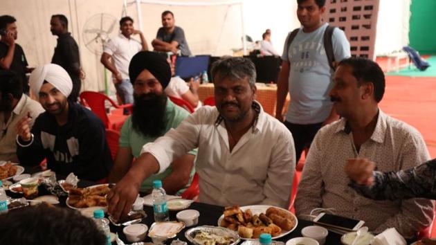 Diljit Dosanjh enjoys his iftar dinner with Soorma crew. Diljit Dosanjh enjoys his iftar dinner with Soorma crew.