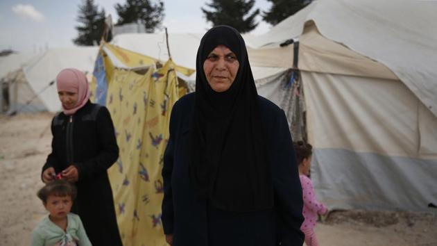Fathiya, the 61-year-old grandmother has tried unsuccessfully for a separate tent to give her son and his wife some privacy. In Douma, Maysaa began losing her balance as she gave what little food her husband brought home all to her children.“She wouldn’t eat, to let her children eat,” Fathiya said. This Ramzan, the 27-year-old is not fasting so that she can boost her diminished health. (Lefteris Pitarakis / AP) Fathiya, the 61-year-old grandmother has tried unsuccessfully for a separate tent to give her son and his wife some privacy. In Douma, Maysaa began losing her balance as she gave what little food her husband brought home all to her children.“She wouldn’t eat, to let her children eat,” Fathiya said. This Ramzan, the 27-year-old is not fasting so that she can boost her diminished health. (Lefteris Pitarakis / AP)
