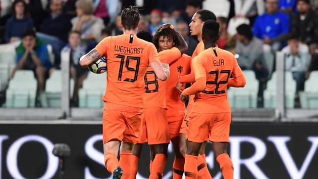 Dutch defender Nathan Ake (C) celebrates after scoring a goal during the international friendly football match between Italy and the Netherlands at the Allianz Stadium in Turin on June 4, 2018.(AFP)