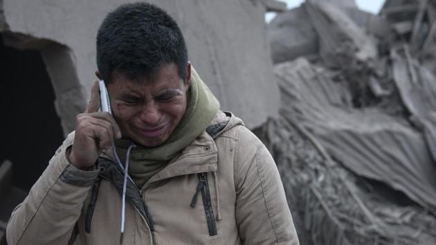 A man cries after seeing the condition of his neighborhood destroyed by the volcanic eruption. “There are missing persons, but we do not know how many,” said Sergio Cabanas of Guatemala’s disaster management agency. More than 3,000 have evacuated with 1,787 people sheltering in the departments of Escuintla, Sacatepequez and Chimaltenango. (Oliver de Ros / AP) A man cries after seeing the condition of his neighborhood destroyed by the volcanic eruption. “There are missing persons, but we do not know how many,” said Sergio Cabanas of Guatemala’s disaster management agency. More than 3,000 have evacuated with 1,787 people sheltering in the departments of Escuintla, Sacatepequez and Chimaltenango. (Oliver de Ros / AP)