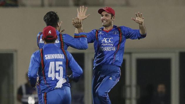 Afghanistan beat Bangladesh by 6 wickets to clinch series 2-0. Get full cricket score of Afghanistan vs Bangladesh, 2nd T20 here.(AP)