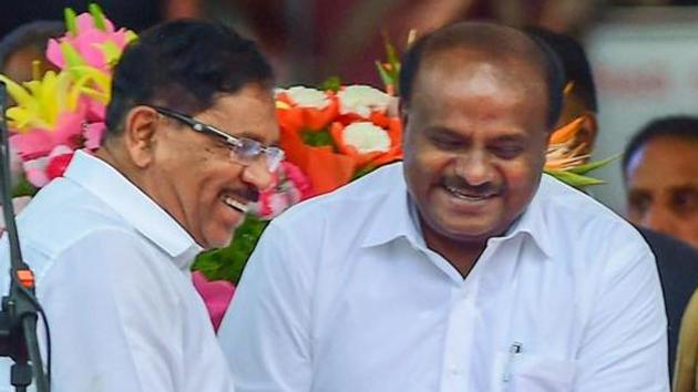 Karnataka chief minister HD Kumaraswamy (right) greets deputy chief minister G Parameshwara after the oath-taking ceremony in Bengaluru on May 23, 2018. (PTI Photo) Karnataka chief minister HD Kumaraswamy (right) greets deputy chief minister G Parameshwara after the oath-taking ceremony in Bengaluru on May 23, 2018. (PTI Photo)