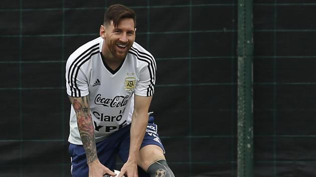 Argentina's Lionel Messi smiles as he takes part in a team training session at the Sports Center FC Barcelona Joan Gamper, in Sant Joan Despi, Spain, Saturday, June 2, 2018. Israel will play Argentina next Saturday, June 9 in a friendly soccer match. (AP) Argentina's Lionel Messi smiles as he takes part in a team training session at the Sports Center FC Barcelona Joan Gamper, in Sant Joan Despi, Spain, Saturday, June 2, 2018. Israel will play Argentina next Saturday, June 9 in a friendly soccer match. (AP)