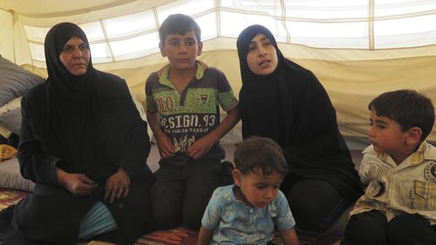 Maysaa Sweidan (2R), 27, who fled the fighting near Damascus, is crammed into a single tent in the overcrowded camp with her family of six. The Sweidans had no choice except to leave their hometown Douma where they endured weeks of bombing, near-starvation from a crippling siege and a suspected chemical attack that almost killed their eldest son. (Lefteris Pitarakis / AP) Maysaa Sweidan (2R), 27, who fled the fighting near Damascus, is crammed into a single tent in the overcrowded camp with her family of six. The Sweidans had no choice except to leave their hometown Douma where they endured weeks of bombing, near-starvation from a crippling siege and a suspected chemical attack that almost killed their eldest son. (Lefteris Pitarakis / AP)