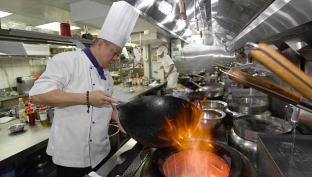 Ken Chan, the executive chef at the five-star hotel restaurant Le Palais in Taipei, demonstrates a cooking technique. (AFP) Ken Chan, the executive chef at the five-star hotel restaurant Le Palais in Taipei, demonstrates a cooking technique. (AFP)