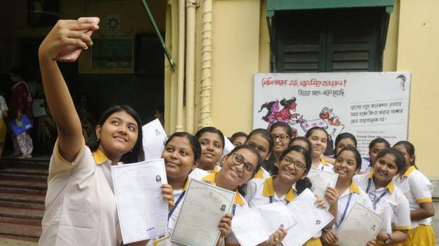 Students of St. Margaret School rejoice after the Madhyamik result in Kolkata on Wednesday. (Samir Jana/ Hindustan Times) Students of St. Margaret School rejoice after the Madhyamik result in Kolkata on Wednesday. (Samir Jana/ Hindustan Times)