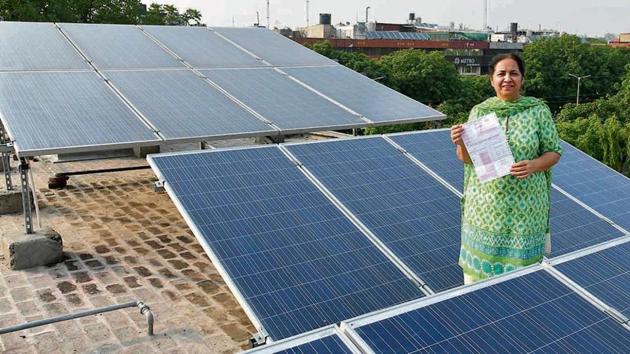 Bye bye bills: Harjit Kaur, who installed an SPV solar plant last year, has been getting zero bills ever since. (Karun Sharma/HT) Bye bye bills: Harjit Kaur, who installed an SPV solar plant last year, has been getting zero bills ever since. (Karun Sharma/HT)