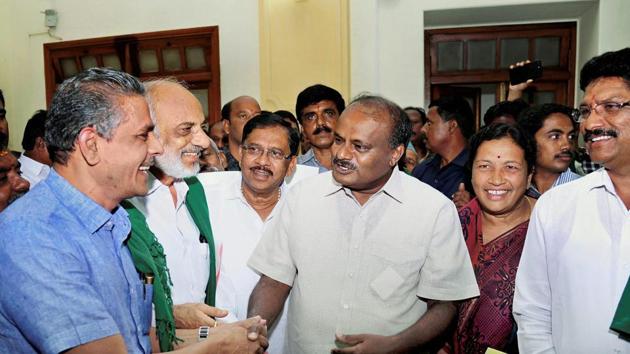 Karnataka Chief Minister H D Kumaraswamy and his deputy G Parameshwara before a meeting on loan waiver for farmers in Bengaluru on May 30, 2018. (PTI) Karnataka Chief Minister H D Kumaraswamy and his deputy G Parameshwara before a meeting on loan waiver for farmers in Bengaluru on May 30, 2018. (PTI)