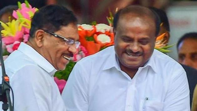 Karnataka chief minister HD Kumaraswamy greets deputy chief minister G Parameshwara after oath-taking ceremony, in Bengaluru. (PTI Photo) Karnataka chief minister HD Kumaraswamy greets deputy chief minister G Parameshwara after oath-taking ceremony, in Bengaluru. (PTI Photo)