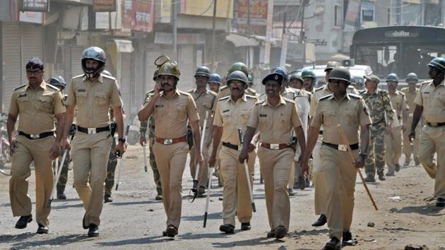 Police officials patrol streets after Dalits called for Maharashtra bandh to protest against Bhima Koregaon violence, at Sangli in Maharashtra.(PTI File Photo) Police officials patrol streets after Dalits called for Maharashtra bandh to protest against Bhima Koregaon violence, at Sangli in Maharashtra.(PTI File Photo)