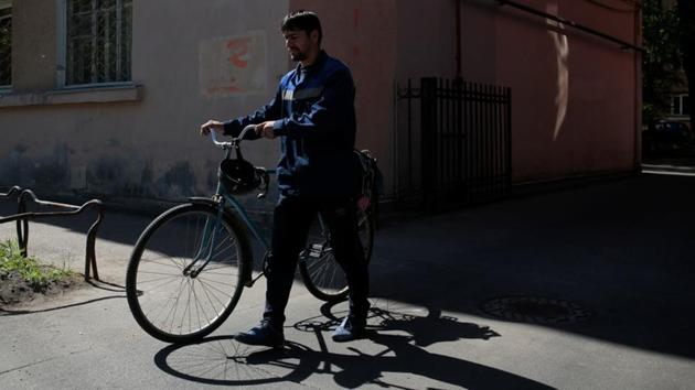 Rustam Mustafakulov, a labour migrant who plays for FC Maxima heads to work. Far from his native Uzbekistan, Mustafakulov has found a second home in St Petersburg, playing soccer with other immigrants from Mali to Turkmenistan. He said life in Russia has not always been easy, that some locals have made comments about his nationality and accused him of taking jobs that should go to Russians. (Anton Vaganov / REUTERS) Rustam Mustafakulov, a labour migrant who plays for FC Maxima heads to work. Far from his native Uzbekistan, Mustafakulov has found a second home in St Petersburg, playing soccer with other immigrants from Mali to Turkmenistan. He said life in Russia has not always been easy, that some locals have made comments about his nationality and accused him of taking jobs that should go to Russians. (Anton Vaganov / REUTERS)