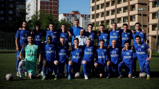 Head coach Bakhtiyar Yusupov poses with players for a group photo after their St Petersburg city championship match. For these migrant players hailing from diverse backgrounds, the game unifies them in an unknown country and binds them together with a sense of brotherhood. (Anton Vaganov / REUTERS) Head coach Bakhtiyar Yusupov poses with players for a group photo after their St Petersburg city championship match. For these migrant players hailing from diverse backgrounds, the game unifies them in an unknown country and binds them together with a sense of brotherhood. (Anton Vaganov / REUTERS)