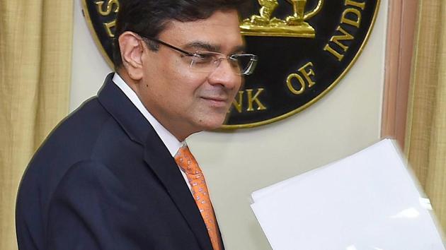 RBI governor Urjit Patel, at the RBI headquarters after the announcement of a 0.25 per cent rate hike by the central bank, in Mumbai on Wednesday.(PTI Photo) RBI governor Urjit Patel, at the RBI headquarters after the announcement of a 0.25 per cent rate hike by the central bank, in Mumbai on Wednesday.(PTI Photo)