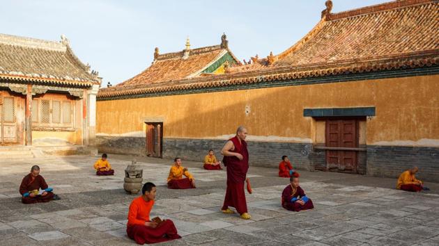 Lobsang Rabten oversees an evening prayer recital session. “It’s easy to chop down a forest, right?” Lobsang Rabten, the monastery’s second-in-command said. “But it takes a long time for new trees to grow back.” He hopes to return the monastery one day to its former glory. (Thomas Peter / REUTERS) Lobsang Rabten oversees an evening prayer recital session. “It’s easy to chop down a forest, right?” Lobsang Rabten, the monastery’s second-in-command said. “But it takes a long time for new trees to grow back.” He hopes to return the monastery one day to its former glory. (Thomas Peter / REUTERS)