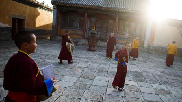 Many monks who grow up at the monastery yearn for the outside world, which they are only allowed to visit twice a year for two weeks. The monastery has 3G internet access, but mobile telephones are restricted to those older than 25. (Thomas Peter / REUTERS) Many monks who grow up at the monastery yearn for the outside world, which they are only allowed to visit twice a year for two weeks. The monastery has 3G internet access, but mobile telephones are restricted to those older than 25. (Thomas Peter / REUTERS)