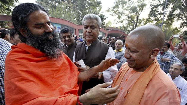 A file photo of Baba Ramdev with Uttar Pradesh chief minister Yogi Adityanath. (HT File Photo) A file photo of Baba Ramdev with Uttar Pradesh chief minister Yogi Adityanath. (HT File Photo)