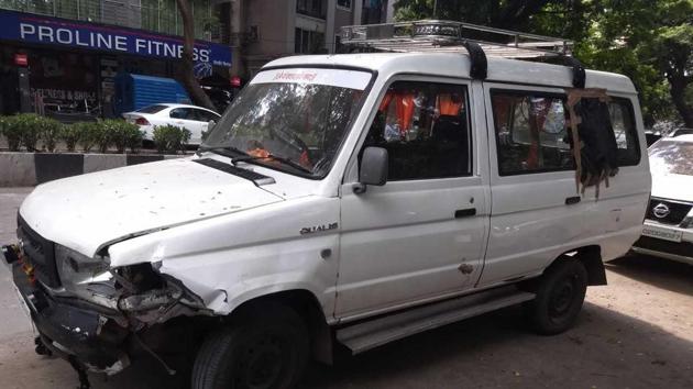 The white Qualis that the man broke into.(HT Photo) The white Qualis that the man broke into.(HT Photo)